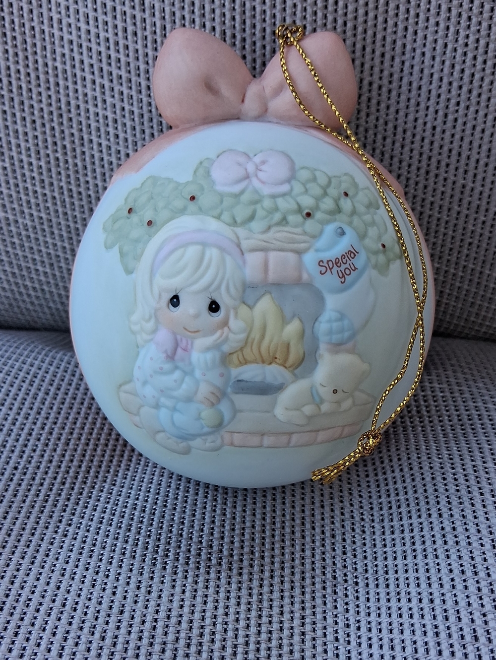 2004 Precious Moments pastel Christmas ornament with girl by fireplace